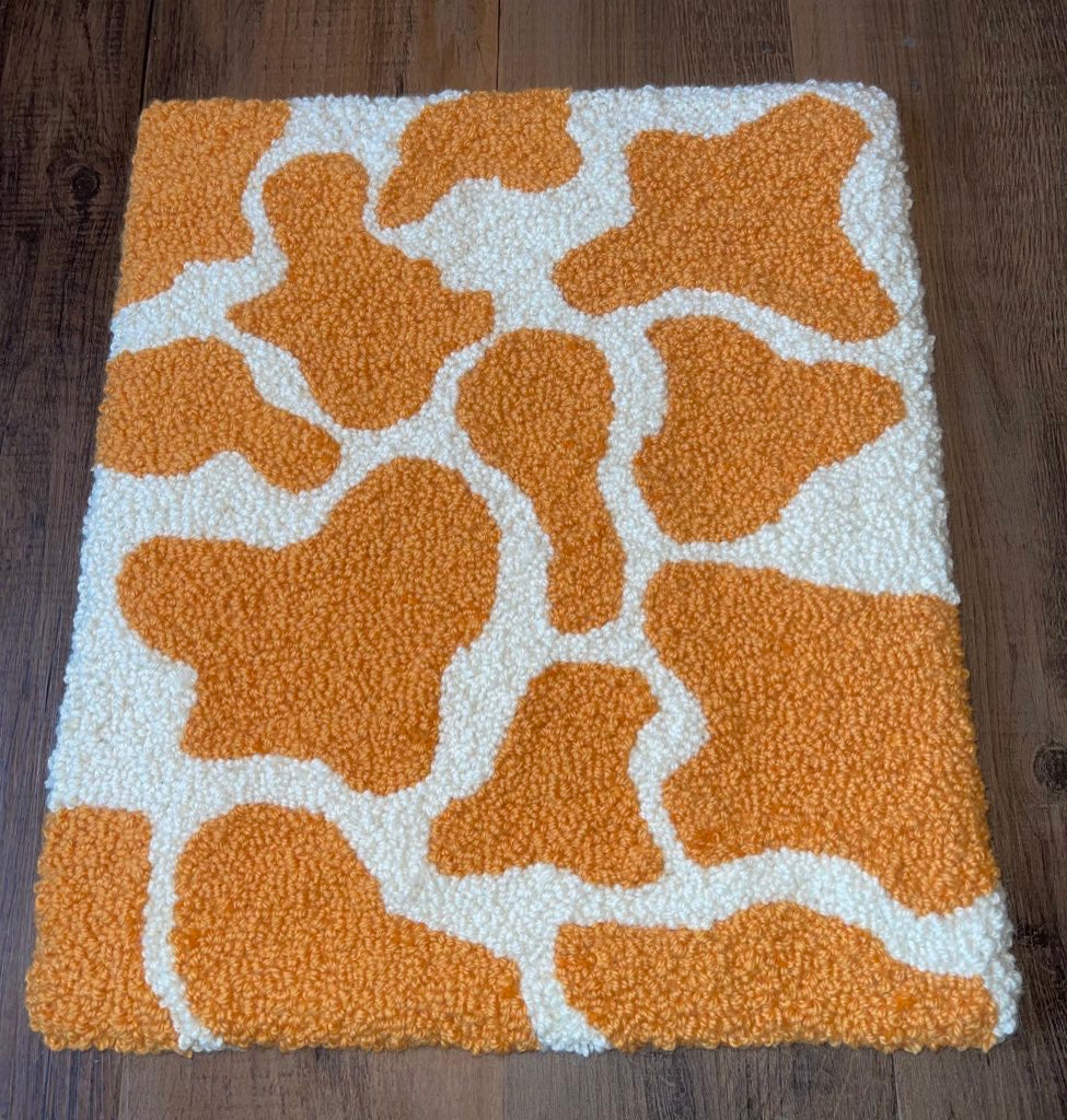 Creamsicle cow rug